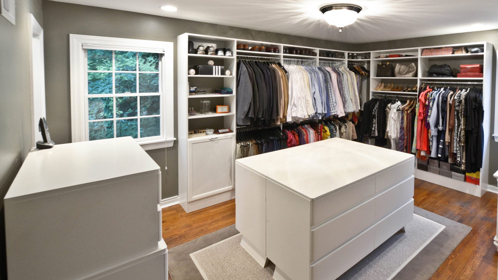 Pantry & laundry room closet organizers with custom shelving in Boston MA.